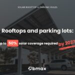 Solar carport above a company parking lot with a car parked underneath, illustrating the French solar rooftop and parking obligation.